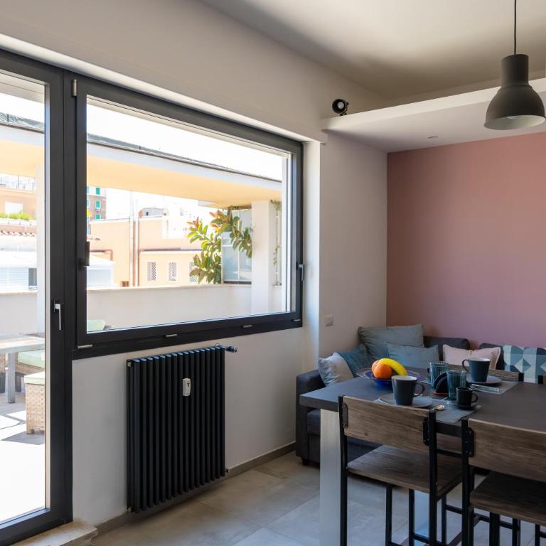 Penthouse with Panoramic Terrace -3 Min to Metro A - Appartamento con 1 Camera da Letto e Terrazza - 3
