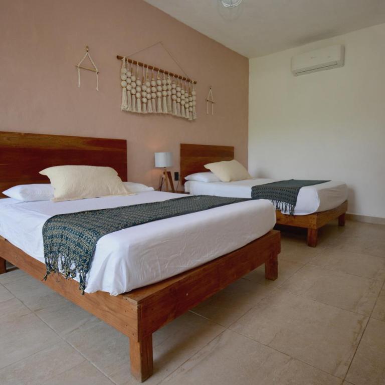 Casa Delia Hotel Downtown - Habitación Cuádruple - vistas al jardín - 4