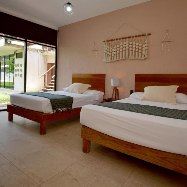 Casa Delia Hotel Downtown - Habitación Cuádruple - vistas al jardín - 5