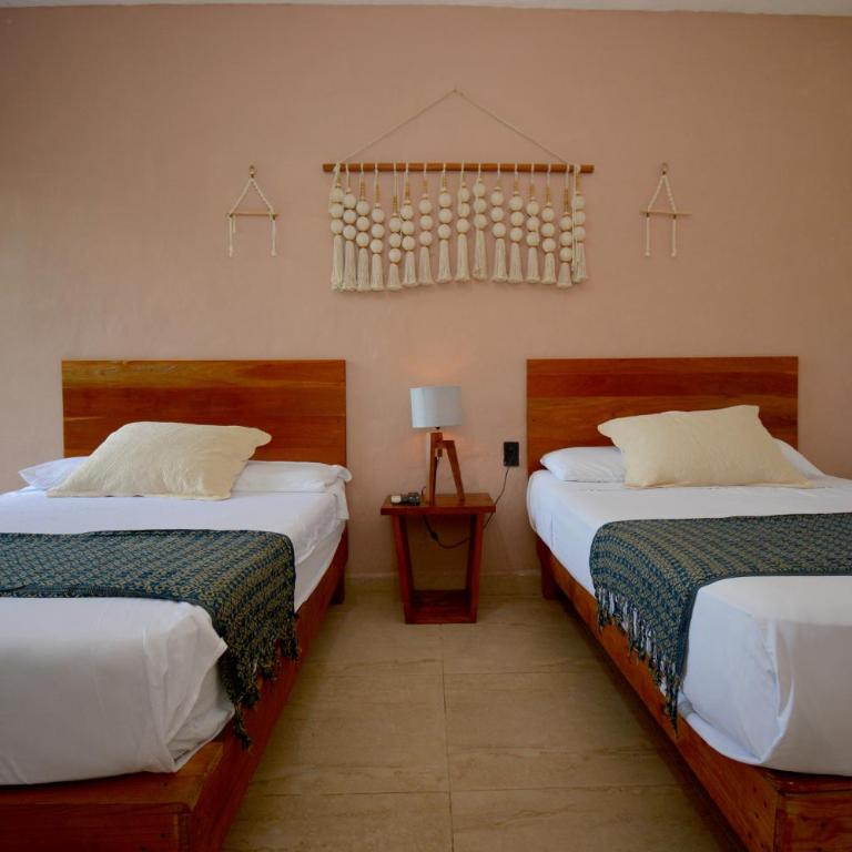 Casa Delia Hotel Downtown - Habitación Cuádruple - vistas al jardín - 8