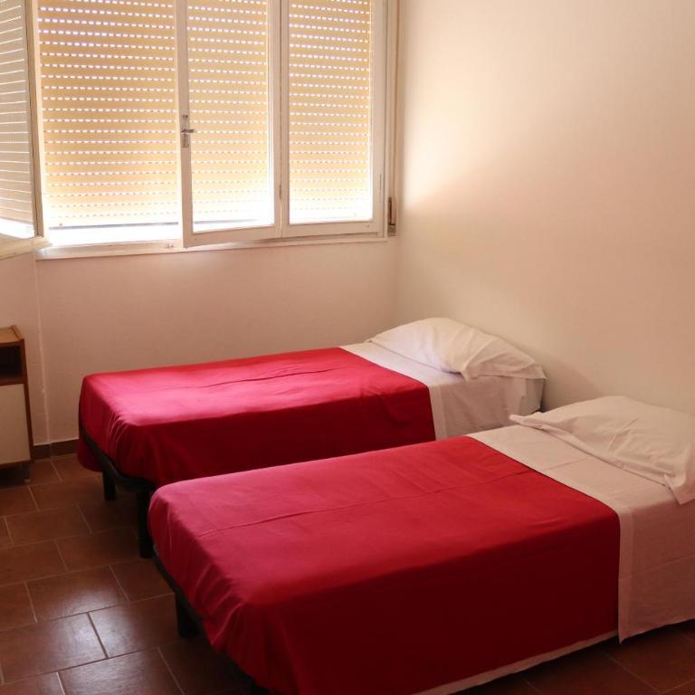 Ostello Paradiso EuroCamp - Camera Doppia con Letti Singoli con Bagno Privato - 1
