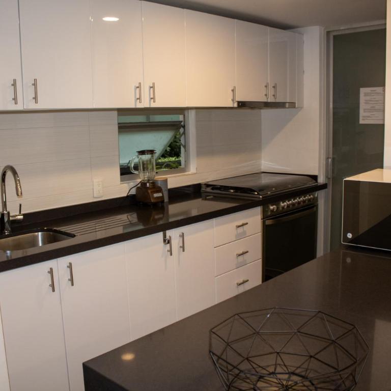 Condo en Zona de Hospitales Condo en Planta Baja - Two-Bedroom Apartment - 19