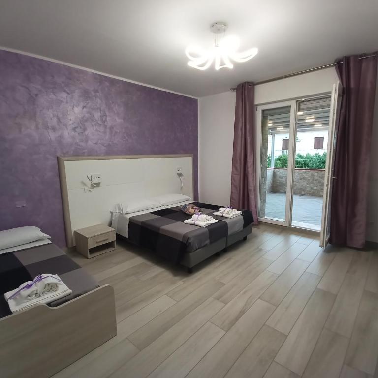 La Dea Rooms - Quadruple Room with Terrace and Private Bathroom - 1