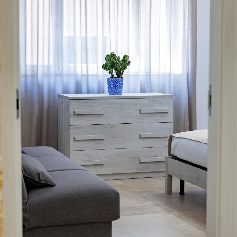 Urban Oasis - Camera Matrimoniale con Letto Supplementare - 6