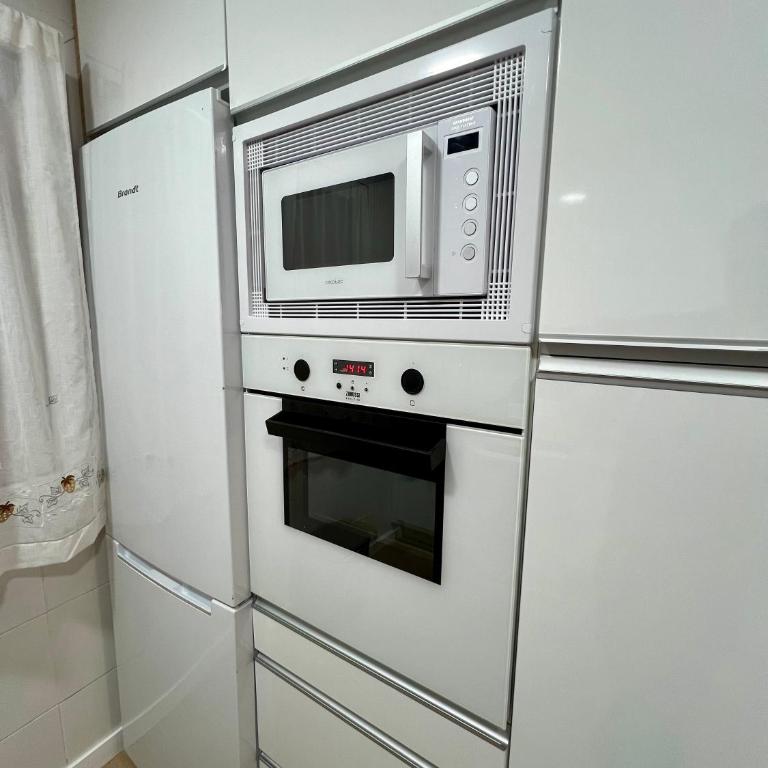 Apartamento Exclusivo Playa San Lorenzo con Parking Gratis - Apartamento de 3 dormitorios - 8