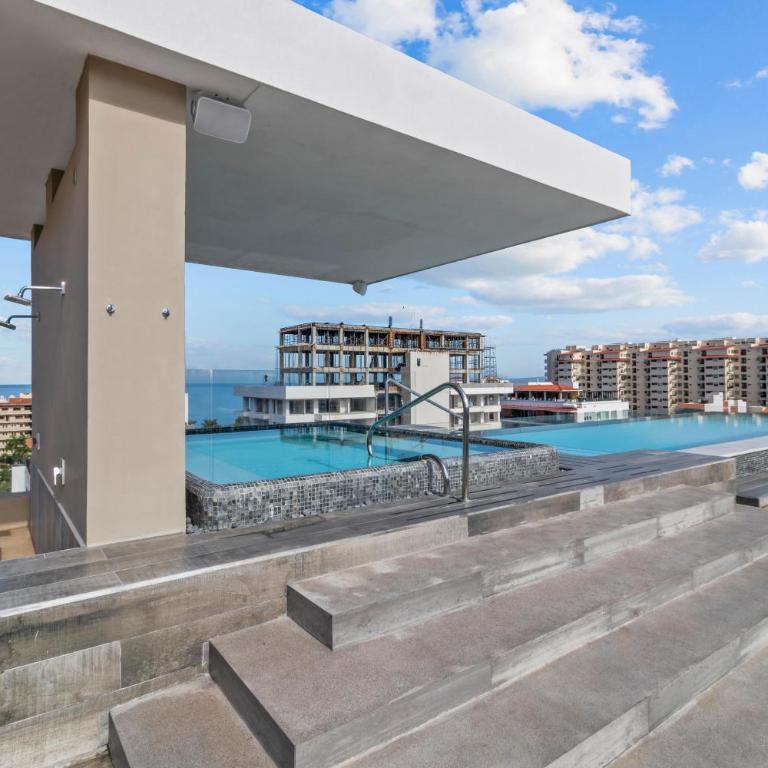 Dedicated workspace, Pool, Gym | Romantic Zone 2BR - Vacation Home - 28