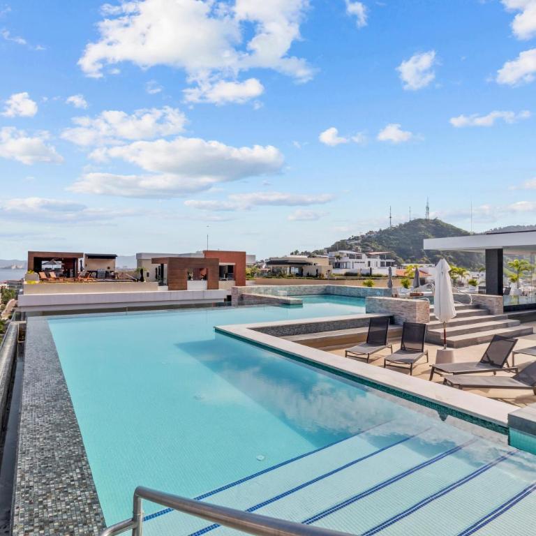 Dedicated workspace, Pool, Gym | Romantic Zone 2BR - Vacation Home - 30