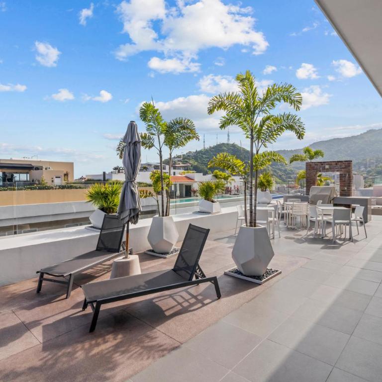 Dedicated workspace, Pool, Gym | Romantic Zone 2BR - Vacation Home - 35
