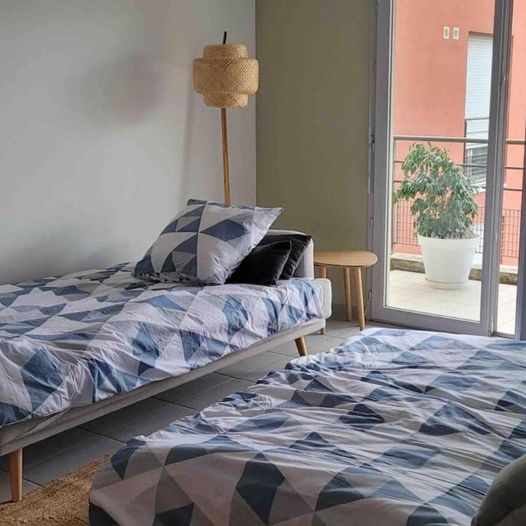 Un balcon à Monplaisir- 4 lits -garage - 47m2 - Appartement 1 Chambre - 25