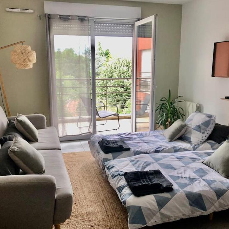 Un balcon à Monplaisir- 4 lits -garage - 47m2 - Appartement 1 Chambre - 23