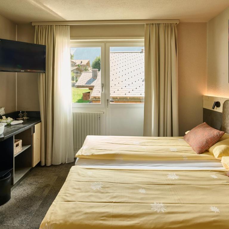 Hotel Central Wolter - Grindelwald - Familienzimmer mit Balkon (3 Personen) - 18