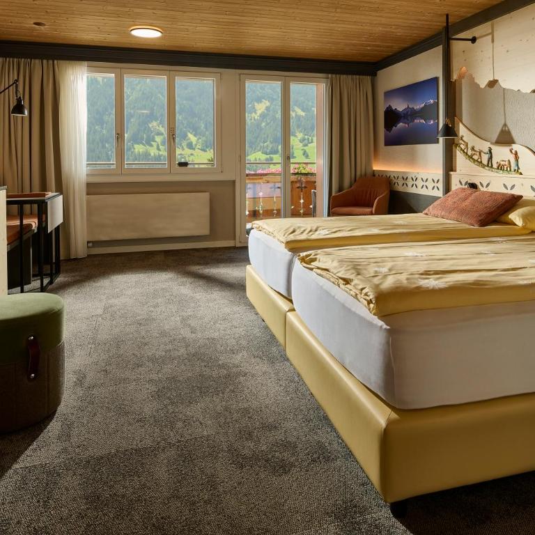 Hotel Central Wolter - Grindelwald - Superior Doppelzimmer mit Blick auf den Eiger - 11