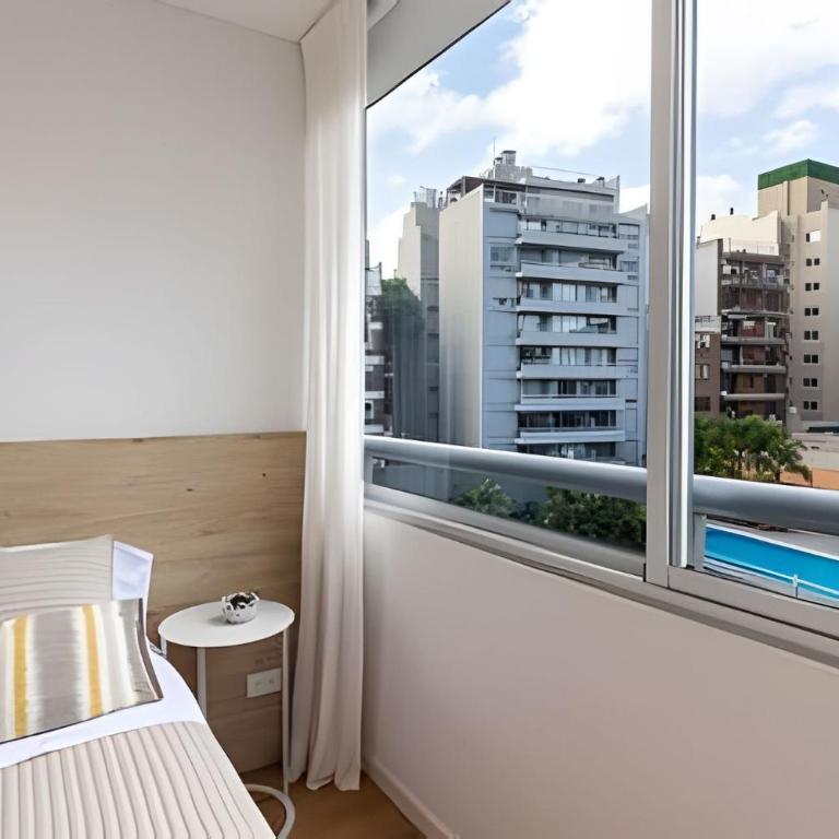 Cozy Apartment w/ Pool, Gym,24h Security & Parking - Deluxe One-Bedroom Apartment with Garden View - 12