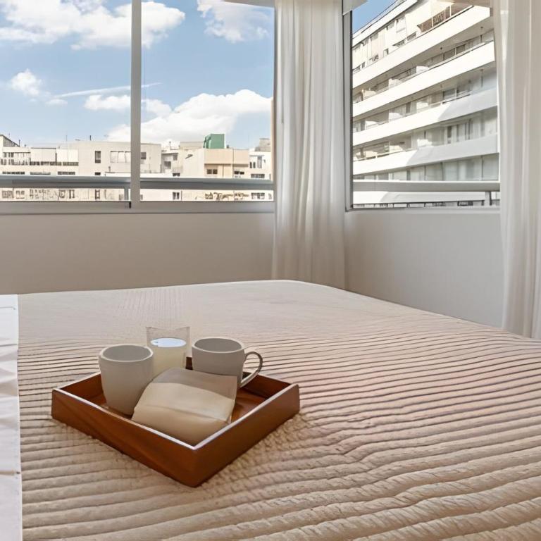 Cozy Apartment w/ Pool, Gym,24h Security & Parking - Deluxe One-Bedroom Apartment with Garden View - 11