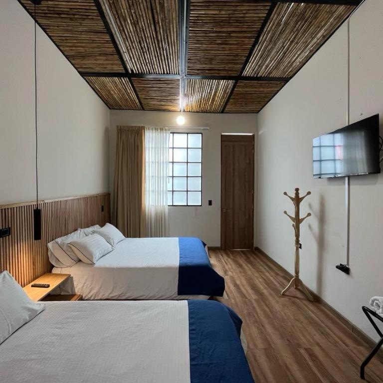 Casa 121 - Habitación Doble con baño privado - 1 o 2 camas - 4