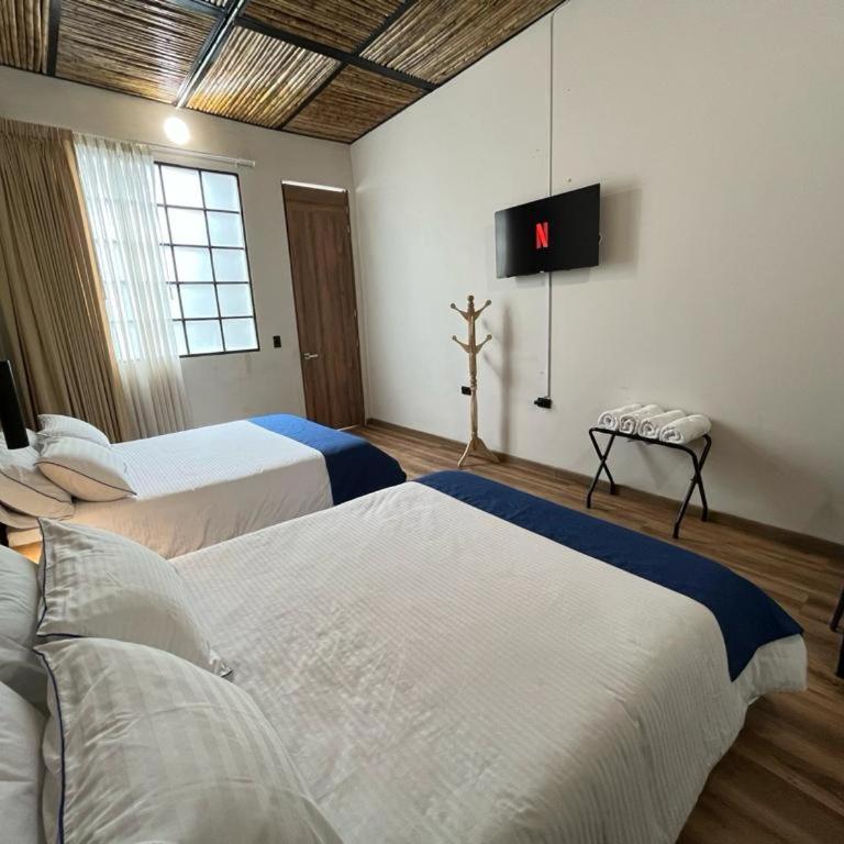 Casa 121 - Habitación Doble con baño privado - 1 o 2 camas - 6