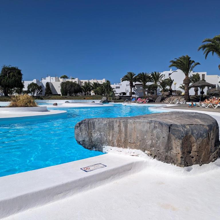Charming Flat in Los Molinos with Terrace & Pools, Near Playa Bastian - Apartamento de 1 dormitorio - 1