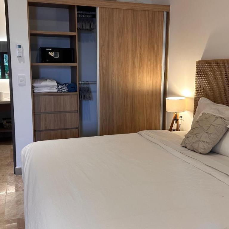 Ipana Luxury Suites By Caribe Rentas - Apartamento de 1 dormitorio con vistas al jardín - 4