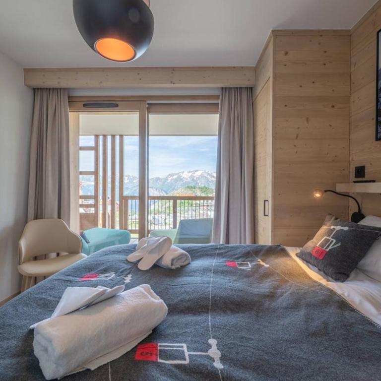 Alpe d'Huez Houses - Alpe Forever - PHOENIX3 - 3 chambres 5 étoiles pour 6 à 8 skis aux pieds - Appartement Premium 3 Chambres - Vue sur Complexe Hôtelier - 3