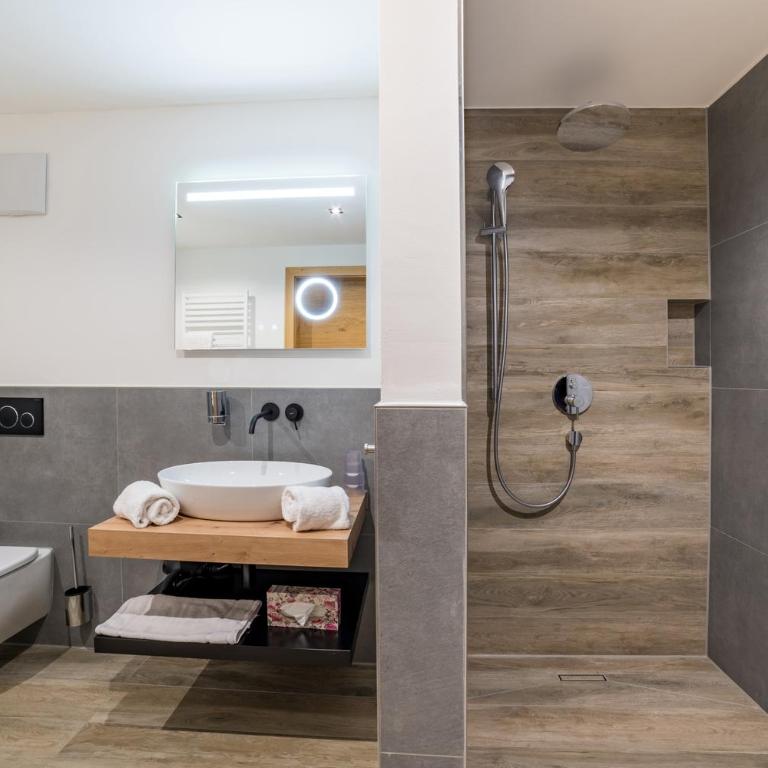 Bergzeit - Hotel & Appartements - Apartment mit 1 Schlafzimmer und Aussicht - 1