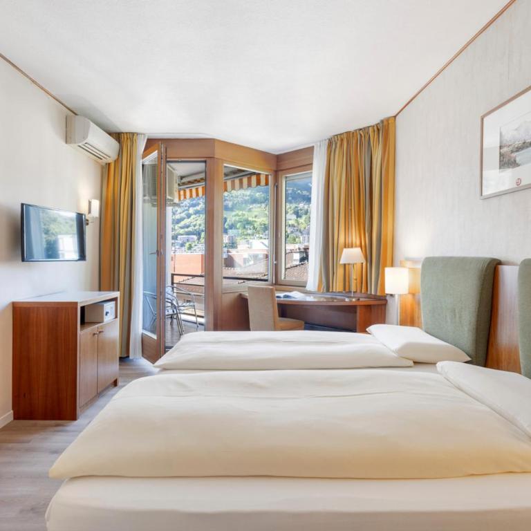 Hotel Delfino Lugano - Camera Matrimoniale Comfort con Balcone - 8