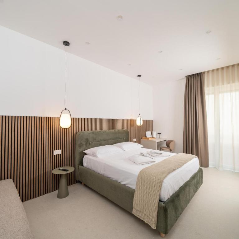 Ypnos Rooms - Camera Tripla Deluxe - 1