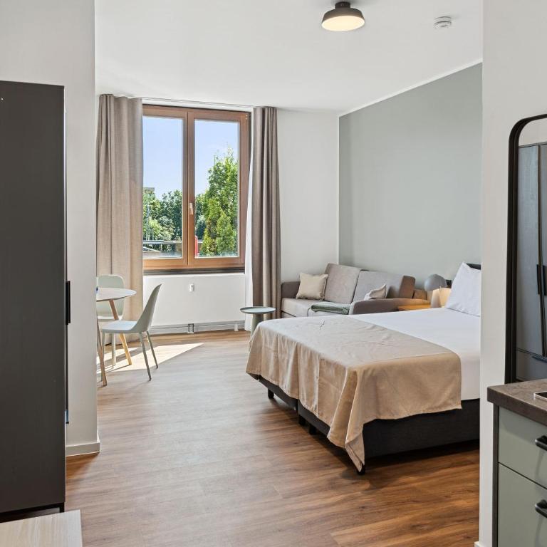 Limehome Memmingen Maximilians - Suite mit Schlafsofa - 2