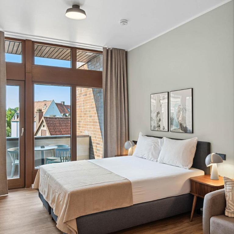 Limehome Memmingen Maximilians - Comfort Suite mit Balkon - 3