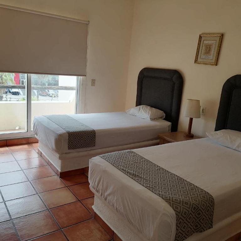 Suites Las Palmas - Habitación Doble con 2 camas grandes - 2
