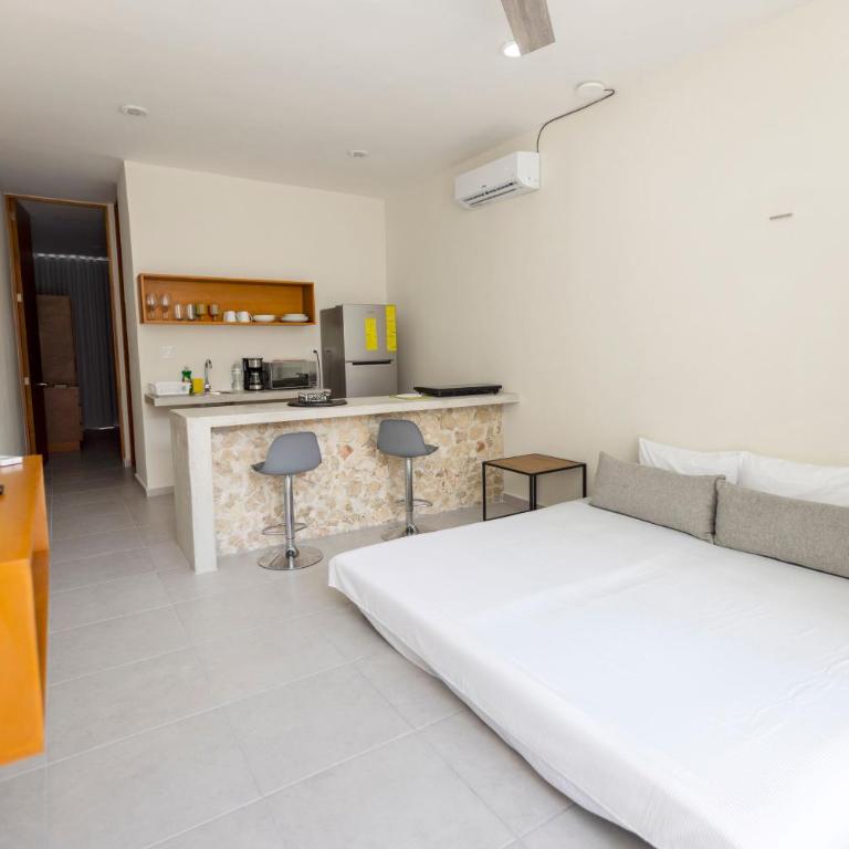 Casa Itzae Hotel Boutique - Deluxe One-Bedroom Apartment with Garden View - 42