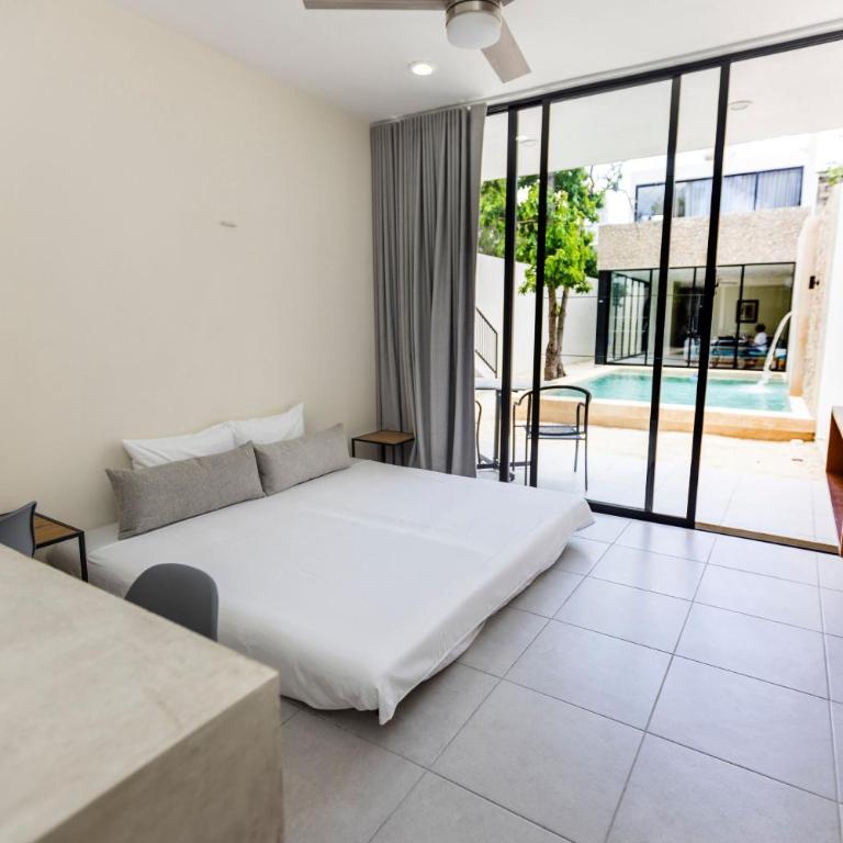 Casa Itzae Hotel Boutique - Deluxe One-Bedroom Apartment with Garden View - 31