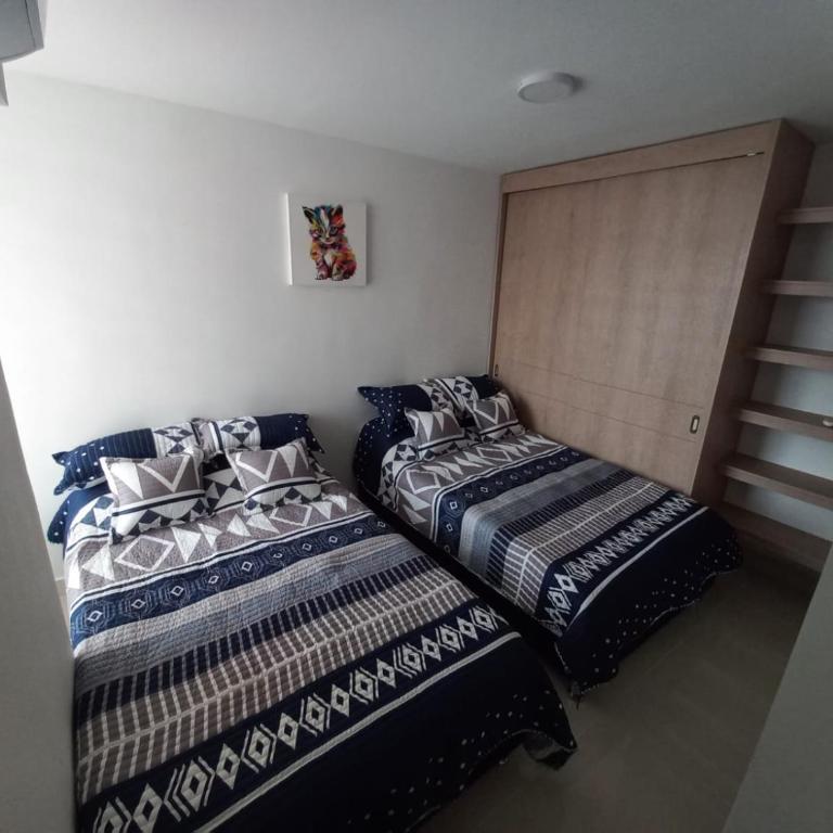 Ricaurte Apto Premium en Peñazul La Morada AC Vista BBQ y Piscinas Ultimo Piso - Three-Bedroom Apartment - 44