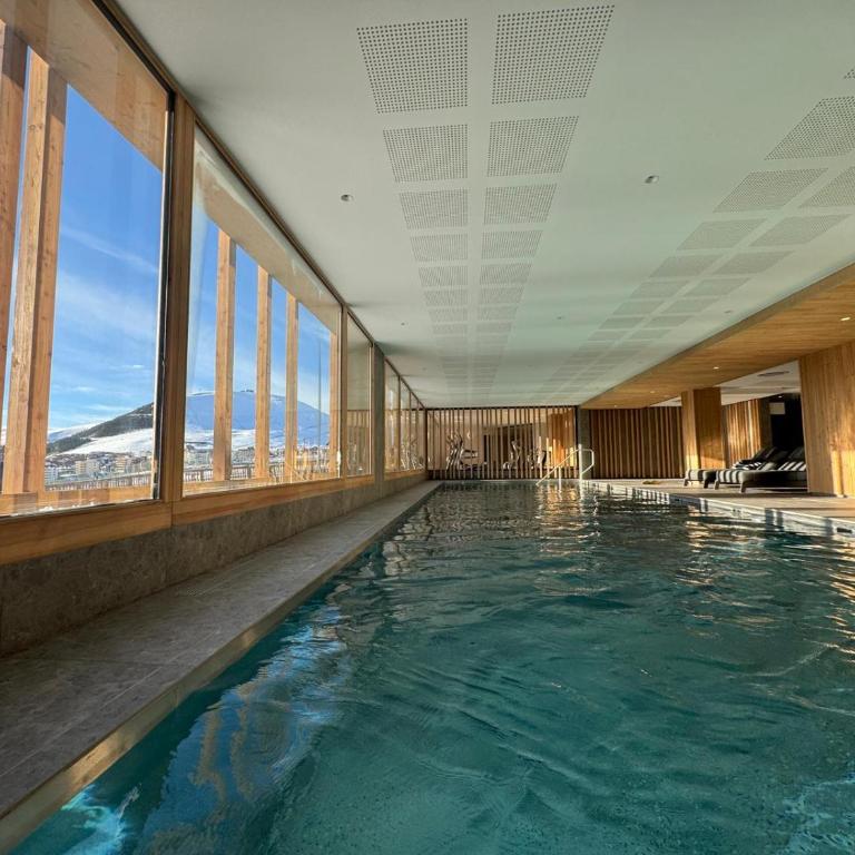 Alpe d'Huez Houses - Alpe Forever - PHOENIX3 - 3 chambres 5 étoiles pour 6 à 8 skis aux pieds - Appartement Premium 3 Chambres - Vue sur Complexe Hôtelier - 2