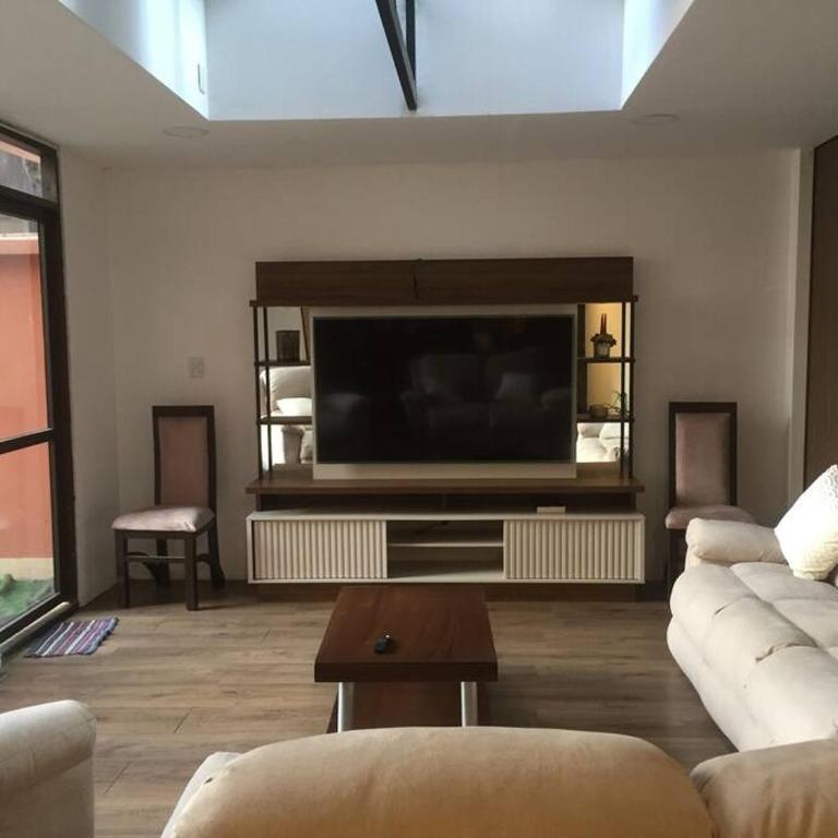 Departamento céntrico con terrazas y estacionamiento - Apartamento de 2 dormitorios - 1