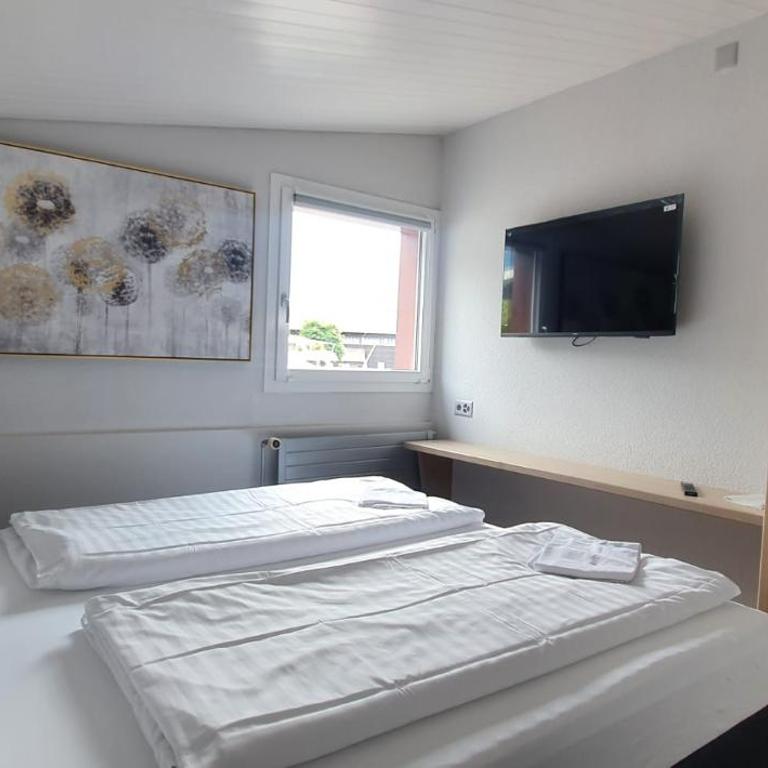 Sleep and Go - Budget - Standard Doppelzimmer mit Gemeinschaftsbad - 3