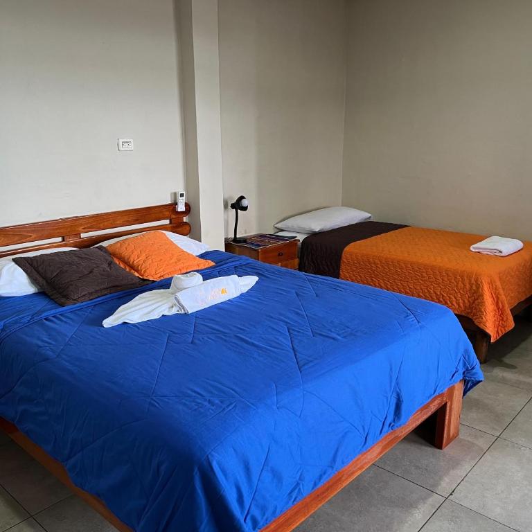 Hostal Cattleya - Habitación Doble Deluxe - 1 o 2 camas - 3