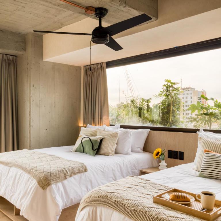 Caliza Roma Residences by Tasman - Apartamento Deluxe de 2 dormitorios con balcón - 1