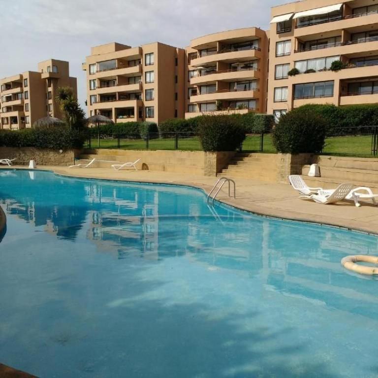Smart Host Rentals - Agradable depto. Mantagua - Apartamento de 2 dormitorios con vistas al jardín - 1