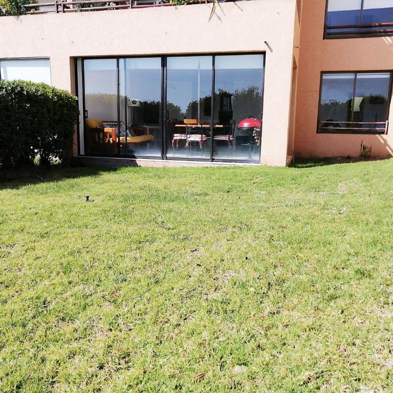 Smart Host Rentals - Agradable depto. Mantagua - Apartamento de 2 dormitorios con vistas al jardín - 10