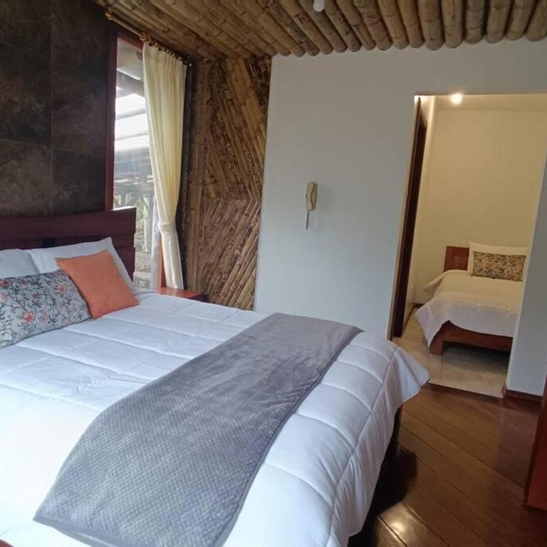 Hospedaje Baños de Agua Santa- Vista al Pailón - Villa - 25