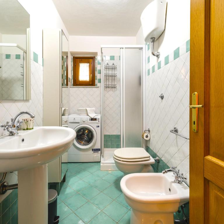 Hostly-La Casa di Marta-Two steps from the Tower - Two-Bedroom Apartment with Garden View - 5