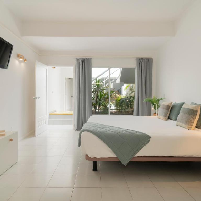 Casa Picon en Puerto del Carmen, con terraza, vistas al mar, piscina y junto a la playa - Apartamento de 2 dormitorios - 13