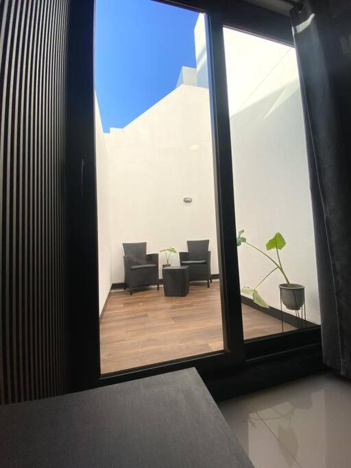 Studio Moderno con Patio Privado - Apartamento de 1 dormitorio - 26