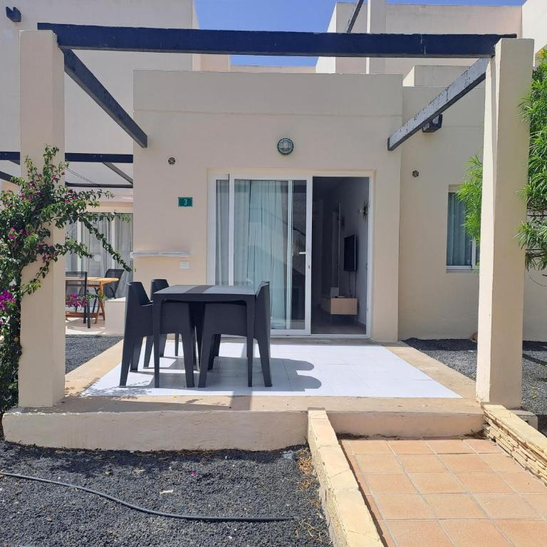 HomeForGuest Apartamento 15 con terraza y piscina en Corralejo - Apartamento - 31