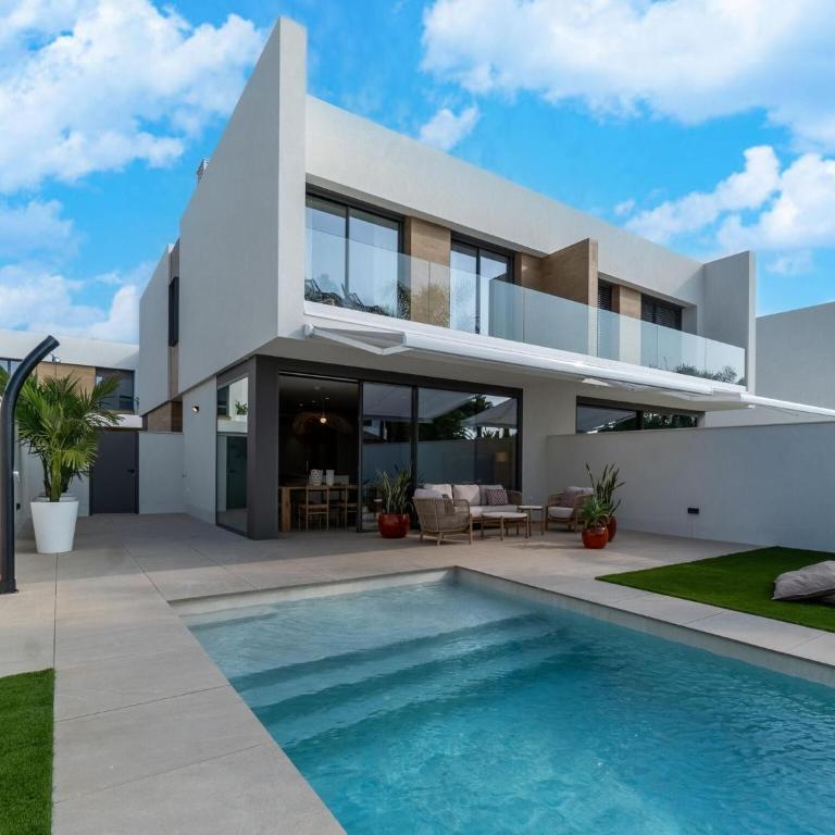 Sunny Villa by Platja Ardiaca - Four-Bedroom Vacation Home - 1