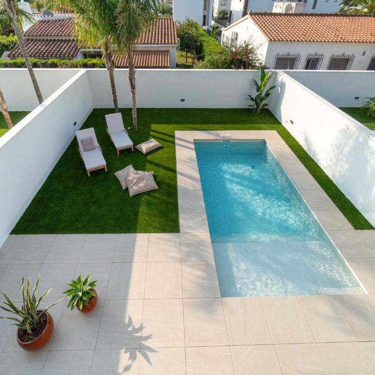 Sunny Villa by Platja Ardiaca - Four-Bedroom Vacation Home - 5