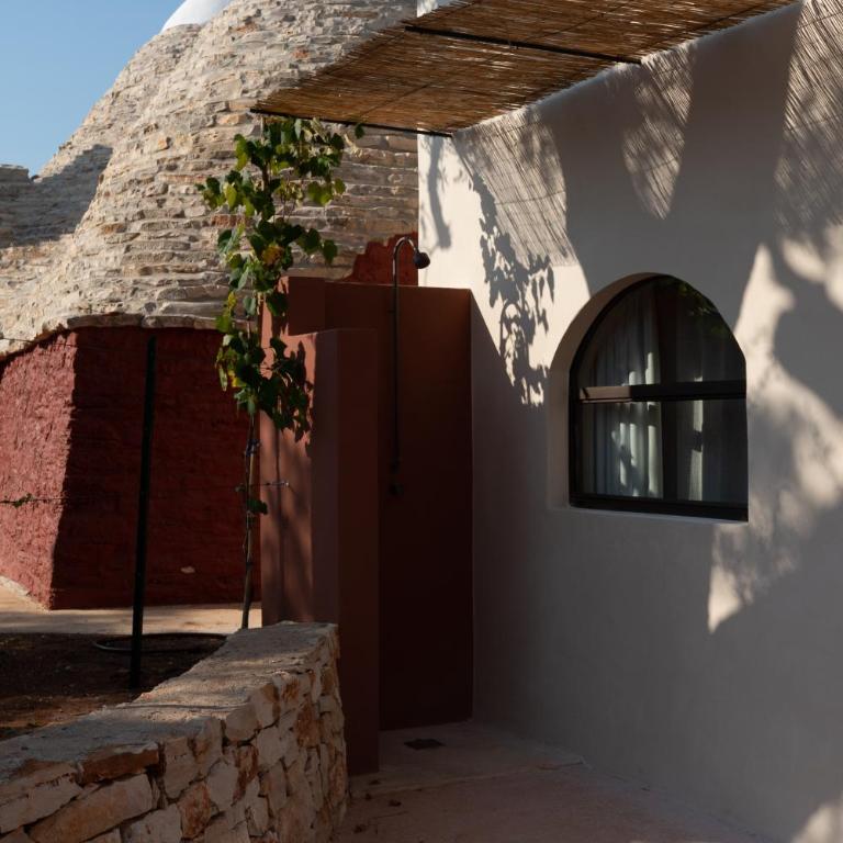 OZIO - Il trullo rosso - Camera Matrimoniale Deluxe con Vasca - 6