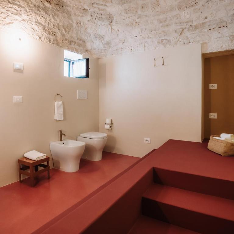 OZIO - Il trullo rosso - Camera Matrimoniale Deluxe con Vasca - 24