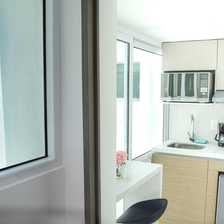 Recien remodelado estudio en la playa, piscina, gimnasio, spa 4D - One-Bedroom Apartment - 52