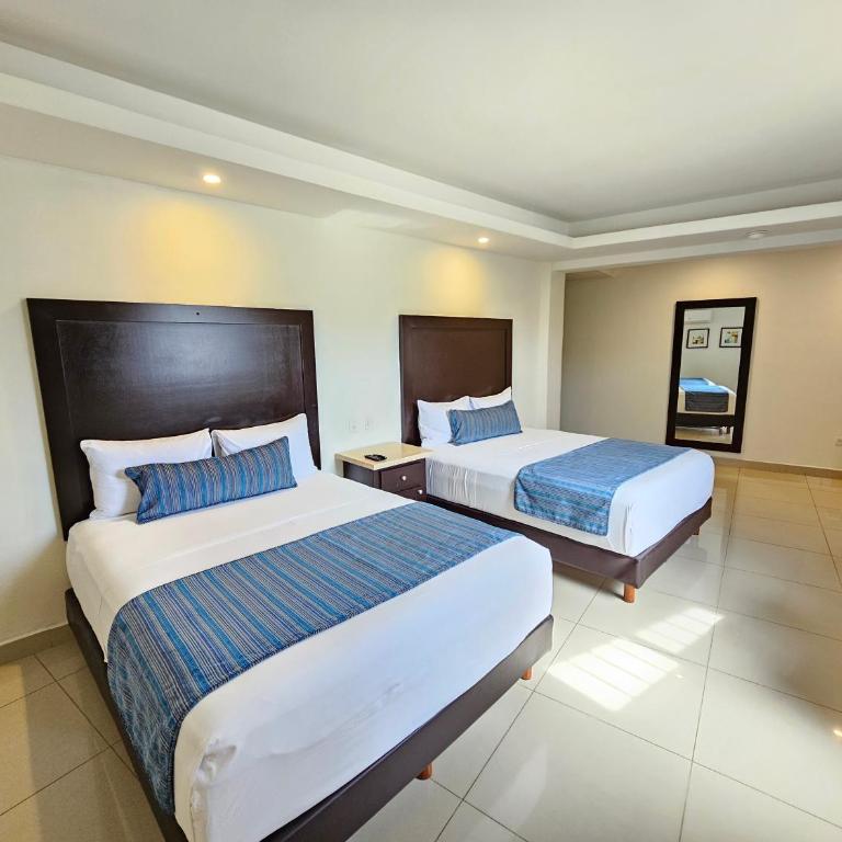 Hotel Maria Elena - Habitación Doble - 2 camas dobles - 4